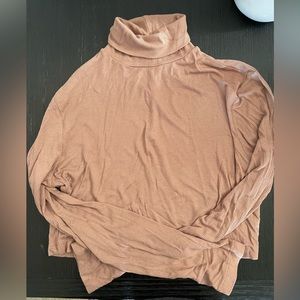 Love charm turtle neck crop top, tan color , size large